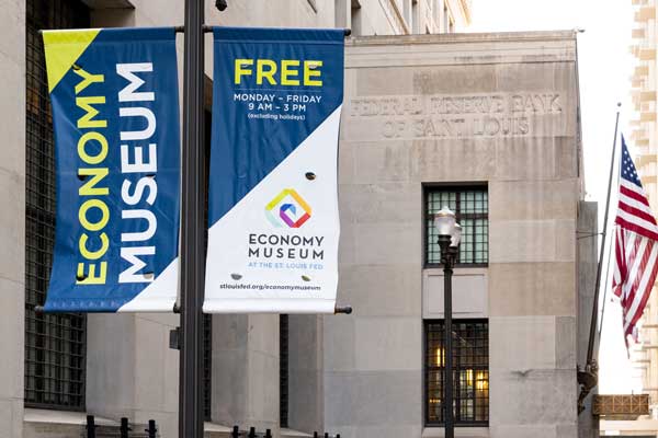 Outdoor banners read: Free Economy Museum at the St. Louis Fed