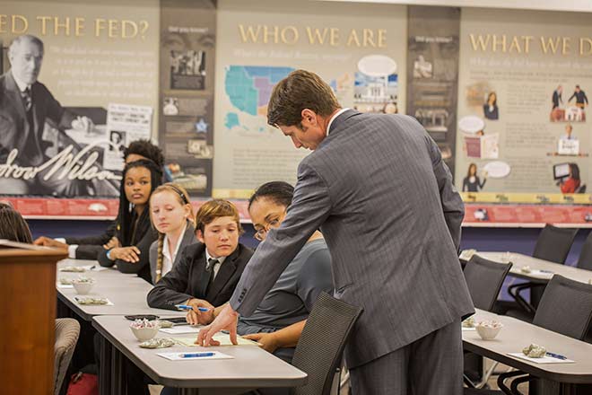 The St. Louis Fed's Kris Bertelsen instructs students.