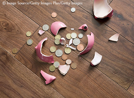 Stock image of a smashed piggy bank