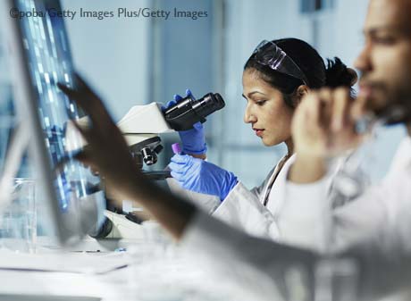 Health care workers using computers in a lab