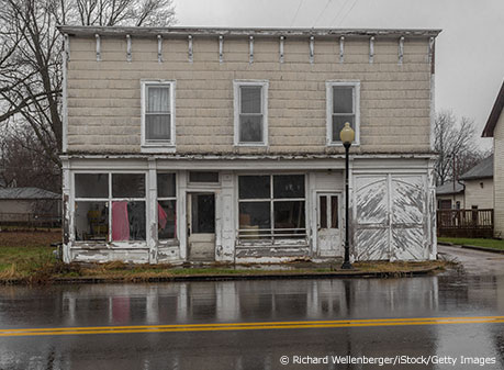 Abandoned building on small town street