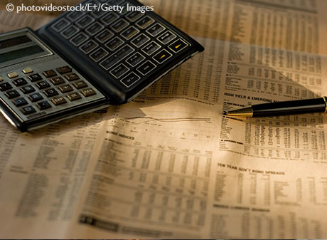 Stock image stocks, financial data, pocket calculator and a pen