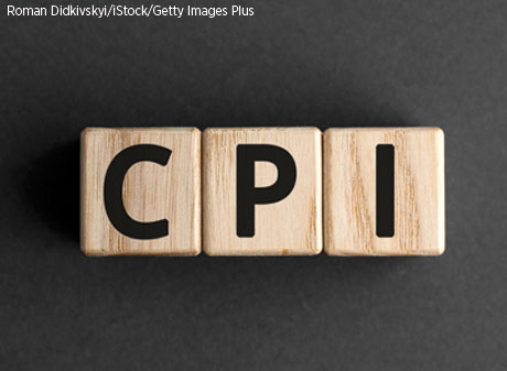 Three wooden blocks with the letters C, P and I.