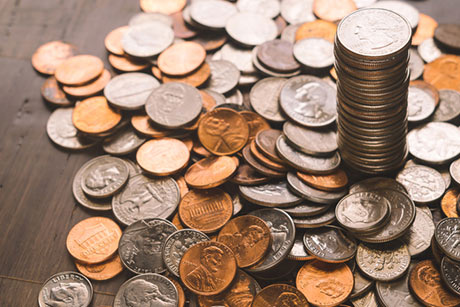 stack of US coins on a table