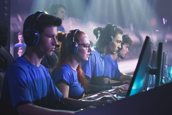 2021 statistics under a photo of an esports team show $243 million and $360 million in revenue from esports in the U.S. and China, respectively, and 73.9 million concurrent viewers of a championship final.