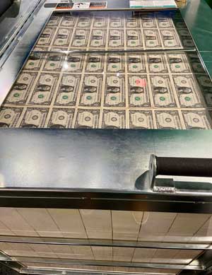 Cart showing $1 bills