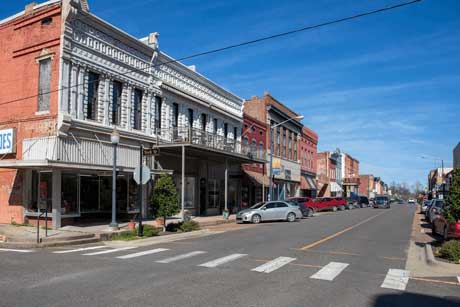 brick buildings line small town street