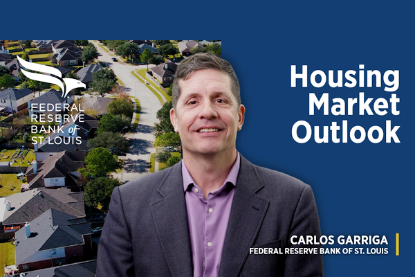 An image shows a man in business attire and includes the text “housing market outlook” and “Carlos Garriga, Federal Reserve Bank of St. Louis” along with the Federal Reserve Bank of St. Louis logo.
