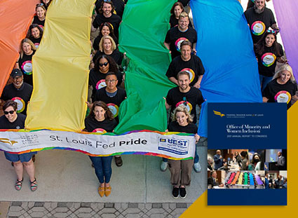 Group of people holding rainbow colored banners.