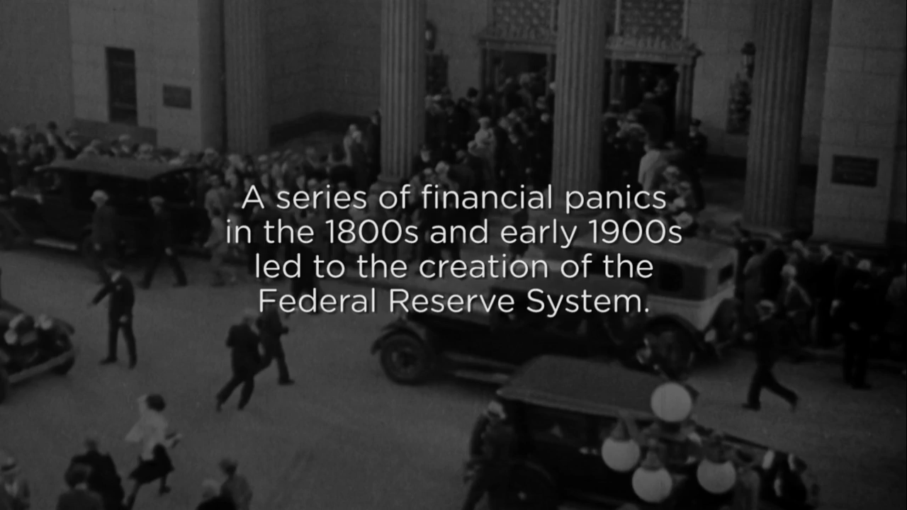 Panic of 1907 video - Black and white scene of people rushing into a bank