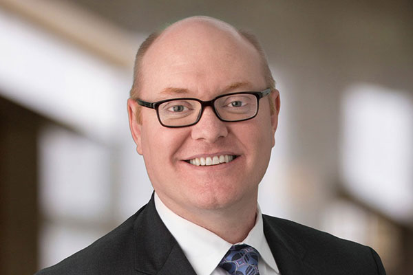 Headshot of  Mark L.J. Wright