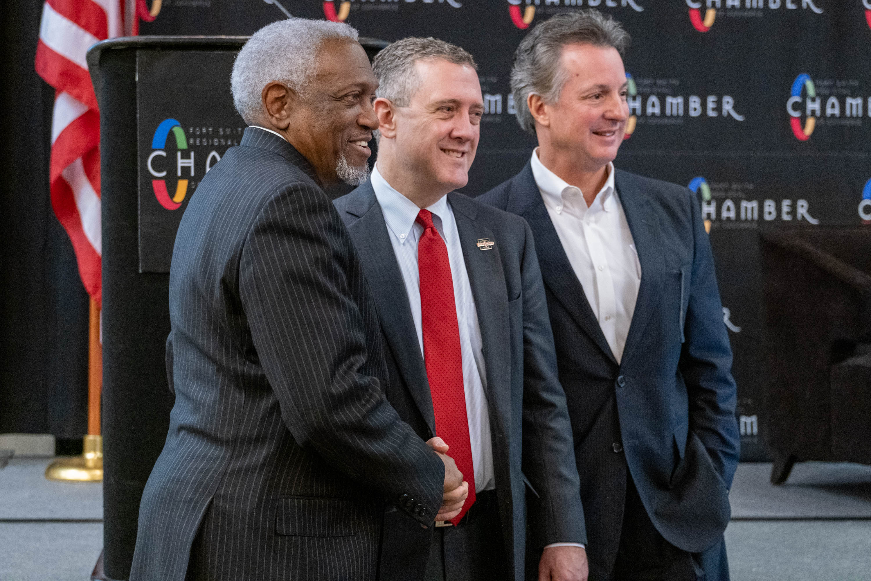 St. Louis Fed President James Bullard (center) on Friday, Feb. 28, 2020, talked with Fort Smith, Ark., Mayor George McGill (left) and Tim Allen, president and CEO of the Fort Smith Regional Chamber of Commerce. Bullard gave a presentation to the chamber during a two-day visit to the northwestern Arkansas city. Bullard meets regularly with groups throughout the St. Louis Fed’s District to share insight on the U.S. economy, as well as gather views from Main Street.
