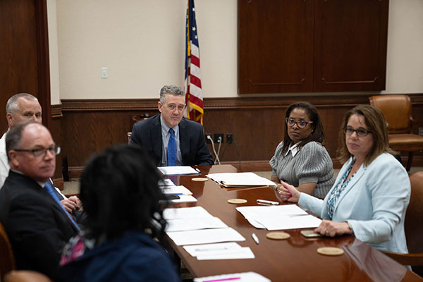 Jim Bullard and Matuschka Lindo Briggs with members of the Little Rock Branch’s board of directors.