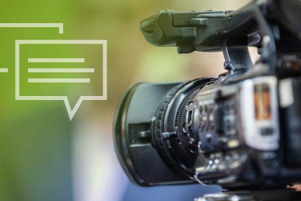 decorative image of the side view of a professional video camera