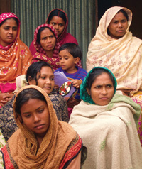 Rural microloan borrowers gather for a weekly group meeting. 