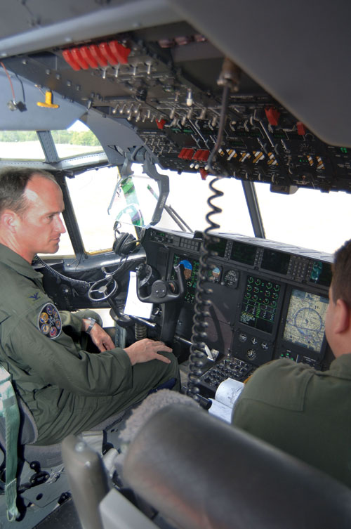 The Columbus Air Force Base has the largest payroll in the area; here, two colonels check out a C-130J. 