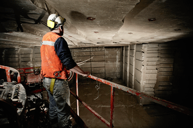 At Elliott Stone Co., Lucas Nikirk uses airbags to detach limestone blocks weighing as much as 15 tons each from the company’s underground quarry.