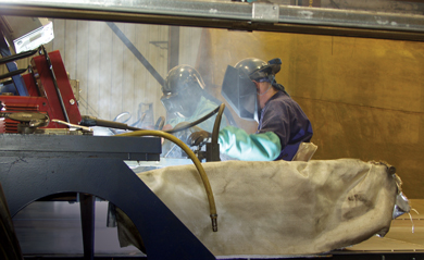 Workers at the American Railcar Industries plant in Paragould, Ark.