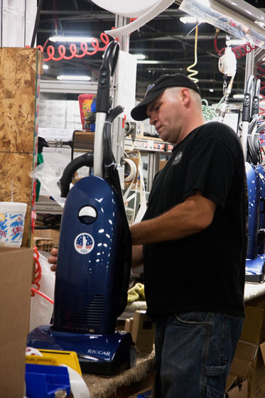 Justin Davis assembles vacuums, clearly marked that they are made in the United States..