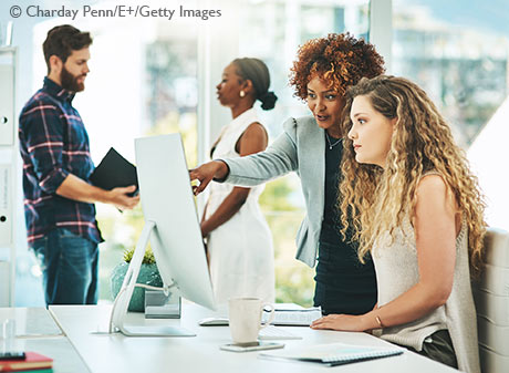 Two women at computer