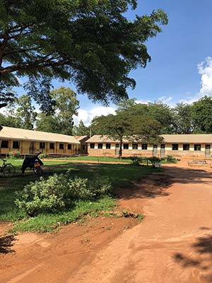 Uganda campus, field and building