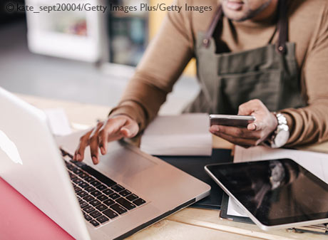 Person using computer for online banking